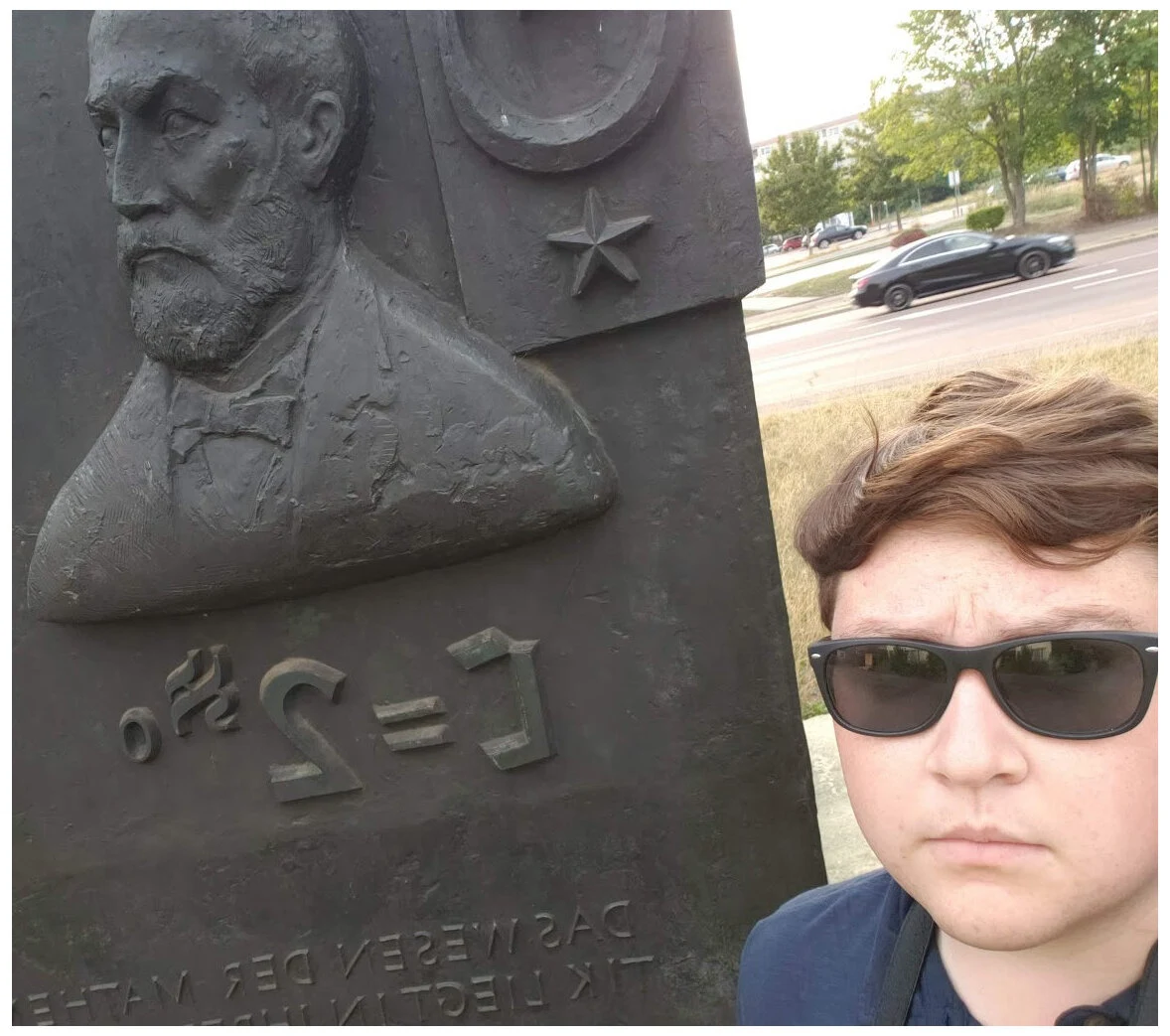 selfie of me with georg cantor
	monument